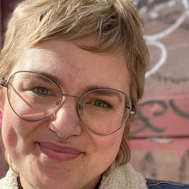 Brittany Krahn smiling in glasses